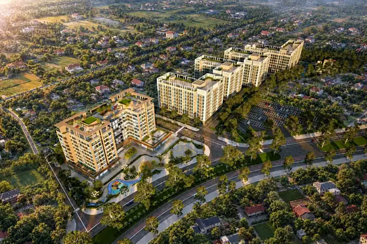 Phối cảnh trên cao khu dự án giữa mảng xanh và khu dân cư